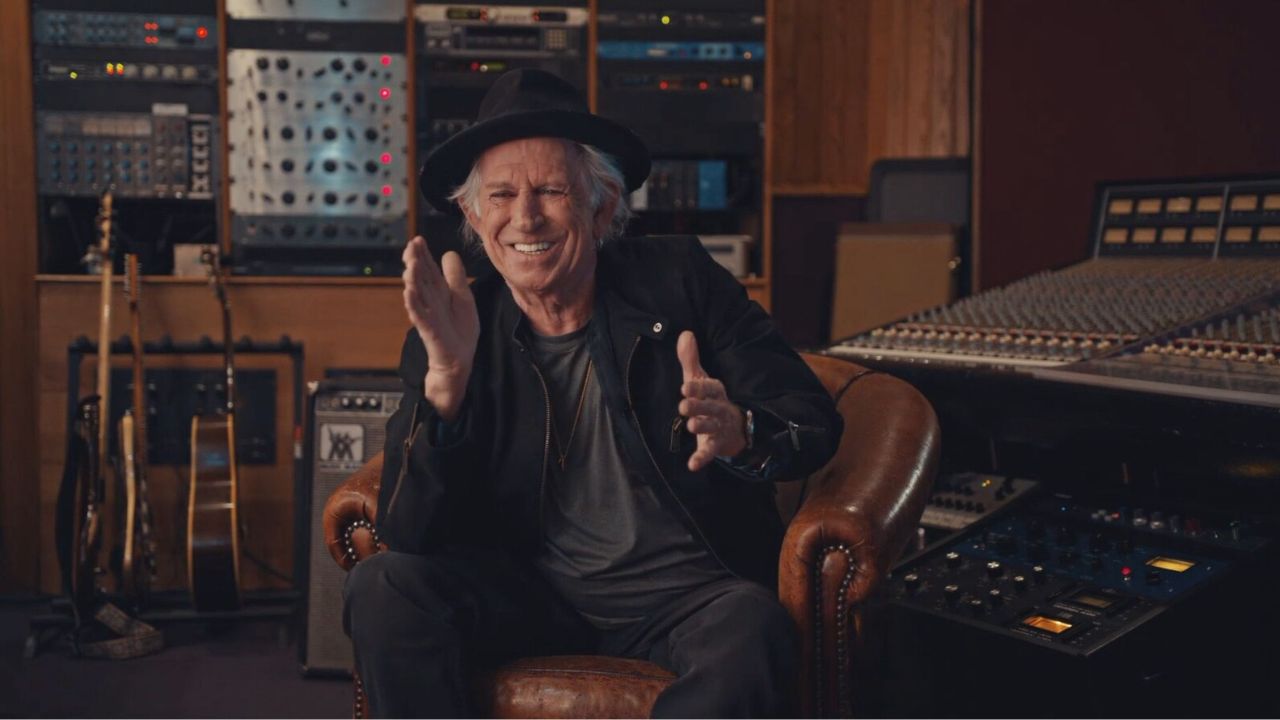 Keith Richards in a studio talking
